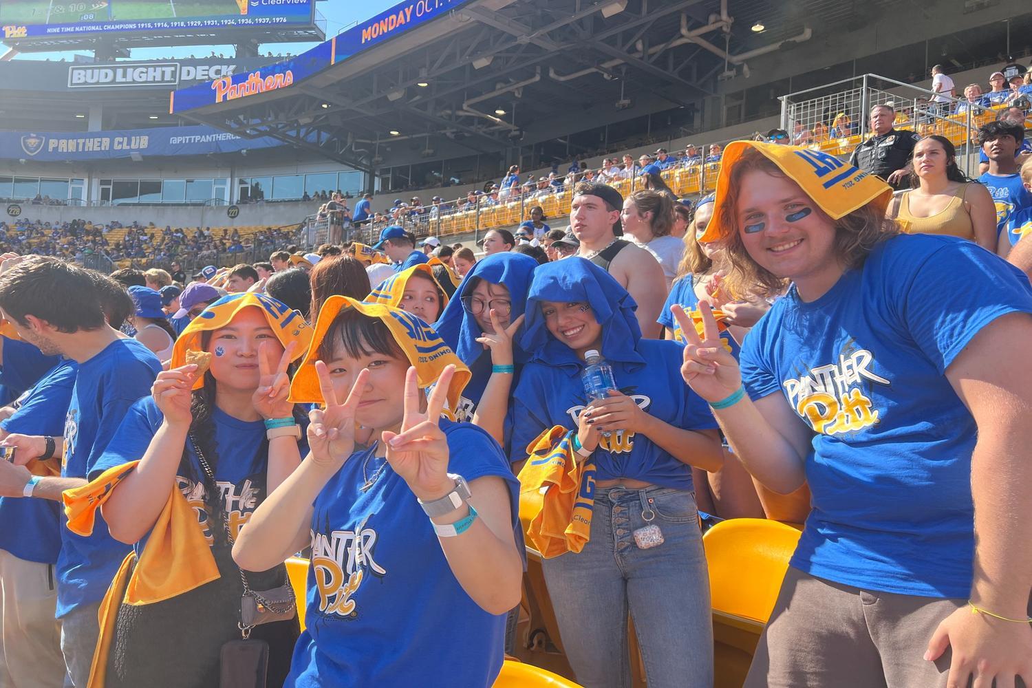 ELI Students and Pitt Students attending a Pitt Panthers football game